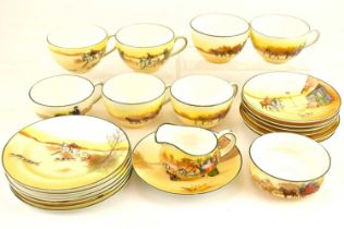 ROYAL DOULTON; a Series Ware 'Coaching Days' twenty-two piece tea service, pattern no. E3804,