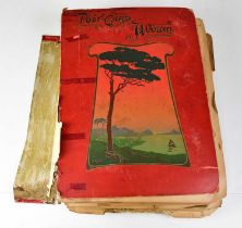 A postcard album containing black and white and colour cards dating from the early 20th century