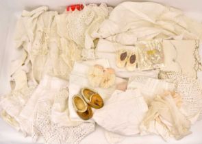 A quantity of Victorian-style and vintage linen clothing, to include undergarments, lace, doilies,