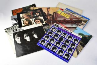 THE BEATLES; ten LPs comprising 'Let it Be... Naked' LP, with 7" disc 'Fly on the Wall' and booklet,