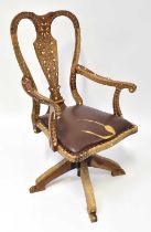 An unusual circa 1920s bone inlaid swivel chair.