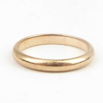 A 9ct rose gold wedding band, size P, approx. 2.7g.