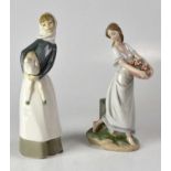 LLADRÓ; two figures of young ladies, one carrying a basket of flowers, signed to base and dated 03.