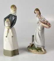LLADRÓ; two figures of young ladies, one carrying a basket of flowers, signed to base and dated 03.