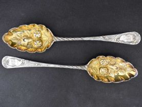 SAMUEL GODBEHERE, EDWARD WIGAN & JAMES BOULT; a pair of George III hallmarked silver berry spoons,