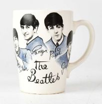 THE BEATLES; a c.1960s Tams Ltd mug featuring black and white images of the band in blue-grey suits,