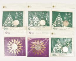 THE ROYAL MINT; seven Christmas Card five pound uncirculated coins, comprising four 2017 'The