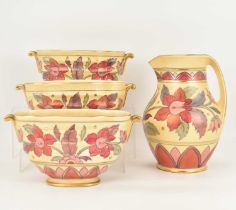 CROWN DUCAL; four Charlotte Rhead inspired decorative ceramics comprising a large jug, height 21.