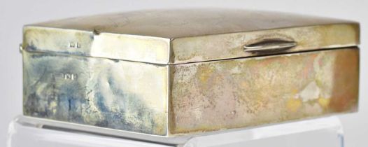 A George V hallmarked silver cigarette box, with six engraved signatures to the lid, with wooden
