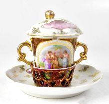 ROYAL VIENNA; a twin-handled chocolate cup, saucer and cover, with white lustre ground, gilt