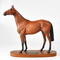 BESWICK; a figure of 'Red Rum' from the Connoisseur model range, in matt glaze and mounted on oval