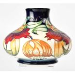 MOORCROFT; a cream ground squat baluster vase in the 'Anna Lily' pattern by Nicola Slaney, height