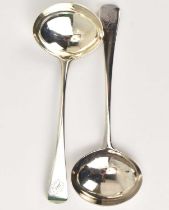 A pair of George III hallmarked silver ladles, indistinct initials to the top, oval bowls, London