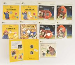 THE ROYAL MINT; ten 50p UK brilliant uncirculated coin packs relating to children's characters,