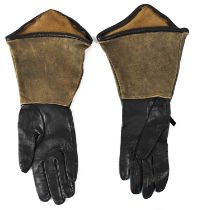 CHER; a pair of brown and black leather gloves from the personal collection of entertainer Cher,