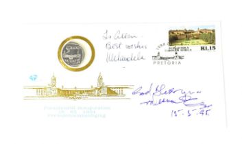 NELSON MANDELA; a first day five rand coin cover bearing the signatures of Nelson Mandela and