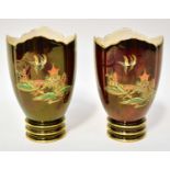 CARLTON WARE; a pair of 'Rouge Royale' vases with chinoiserie decoration, each on a circular foot,