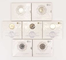 THE ROYAL MINT; seven £5 UK brilliant uncirculated coin packs, comprising four 'HRH Prince George of