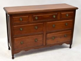 A 19th century mahogany chest of two small and one long drawer, over two banks of wide drawers, with