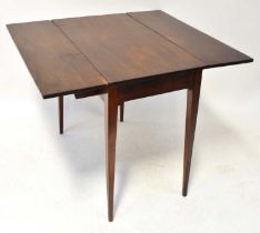 A 19th century mahogany Pembroke table with tapered supports, 73 x 85 x 93cm (closed 47cm).