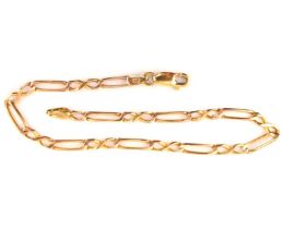 A 9ct gold Figaro link bracelet, length 17cm, approx. 3.3g.