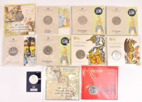 THE ROYAL MINT; ten UK £5 uncirculated coin packs comprising '2021 Lunar Year of the Ox', 2017 and