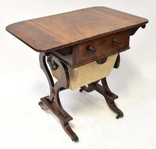 A 19th century mahogany workbox with drop-leaf sides, central single drawer over pull-out work