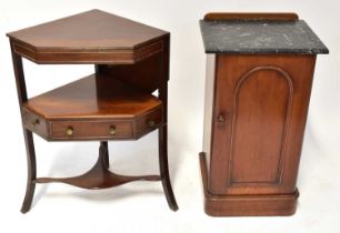 A Victorian walnut marble topped pot cupboard, the single door with arched panel, raised on plinth