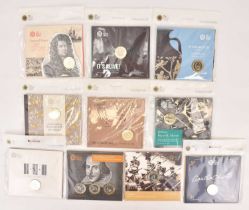 THE ROYAL MINT; ten £2 brilliant uncirculated coin packs comprising 'Agatha Christie', 'D-Day The