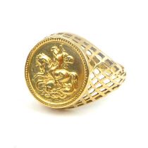 A 9ct gold signet ring with central coin-style George and Dragon circular panel, open basket