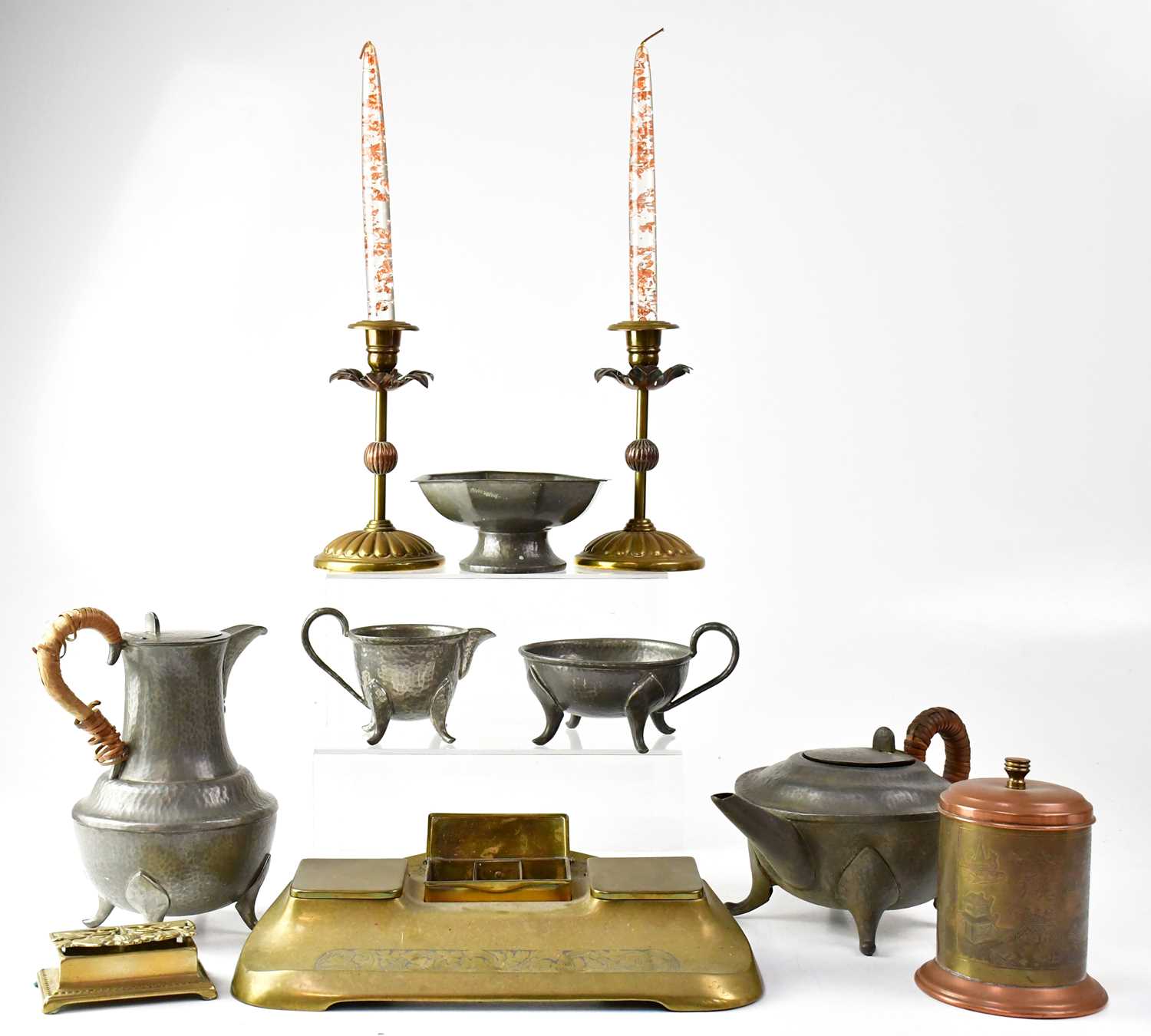 A quantity of metalware including a Roundhead leadless pewter four-piece tea service, a Lion