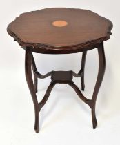 An Edwardian mahogany inlaid shaped occasional table, raised on slender cabriole supports united