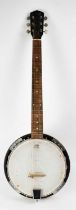 A Martin Smith banjo in soft carry case (af). Condition Report: - Very grubby, strings with some