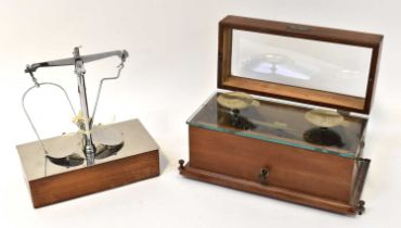 HENRY TROEMNER, PHILADELPHIA; a cased balance scale with silver plated pans and a further example by