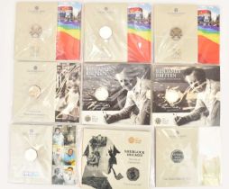 THE ROYAL MINT; nine 50p brilliant uncirculated coin packs comprising 'One Nation Made By Many', two