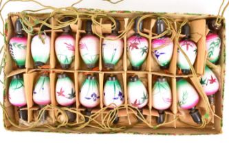 A set of eighteen lights in the form of glass Chinese lanterns with floral hand-painted design.