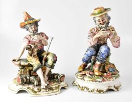 CAPODIMONTE; two figures of seated bearded gentlemen, one with a pipe and a fish, and the other with