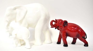 ROYAL DOULTON; a white figure group of two elephants, 'Images of Motherhood', height 22cm, and a