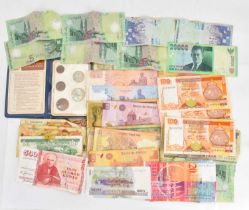 A quantity of mixed UK and World vintage banknotes to include Cyprus, Nagra Malaysia, ten and twenty