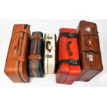 Five various vintage suitcases to include leather examples, together with a quantity of