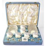 ROYAL WORCESTER; a cased set of six cabinet cups and saucers, in 'Lady Evelyn' Pattern, with six