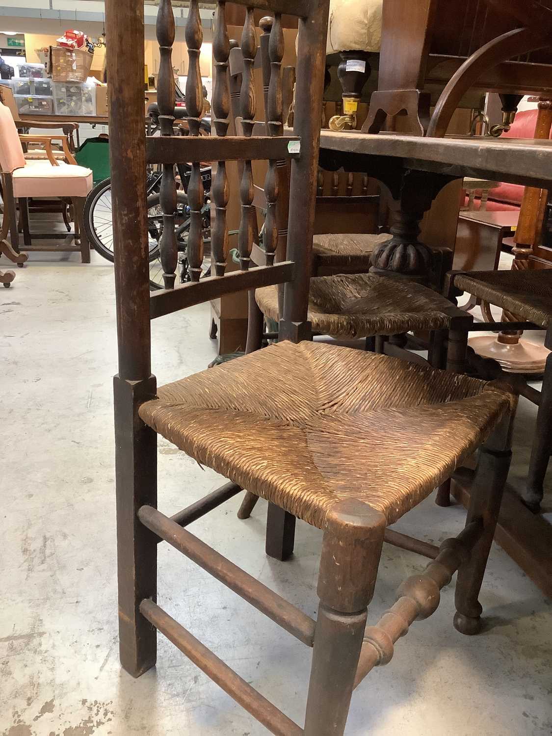 A 19th century oak plank top refectory table on carved cup and cover legs united by a stretcher, - Image 5 of 6