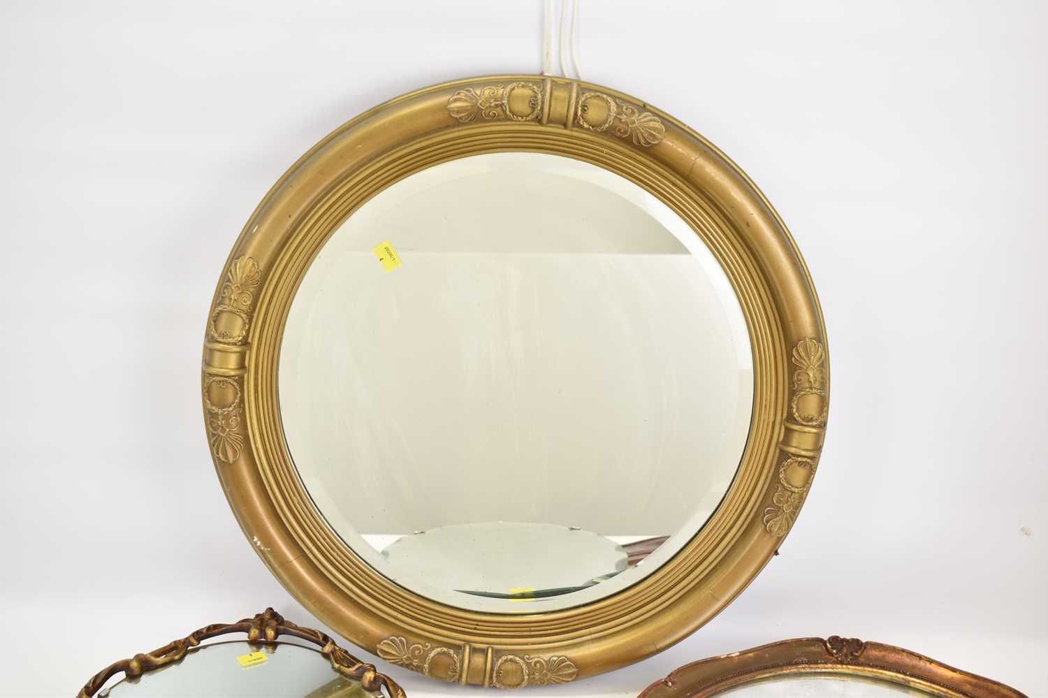 Four wall mirrors, comprising an oval example with bevelled edge, length 45cm, a circular mirror - Image 5 of 5