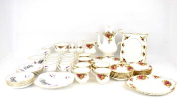 A thirty-one piece Royal Albert 'Old Country Roses' tea set, comprising coffee pot, milk jug,