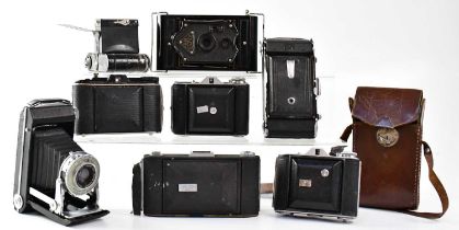 A quantity of vintage folding cameras to include a Ragar no. 6, Ensign Cupid, Zeiss Ikon, Ensign