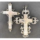 Two large silver crosses, height 10.5cm and 8cm, both engraved with image of Christ and in ornate