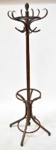 A mid-century bentwood hat stand with six scrolling hooks, above turned column and umbrella storage,