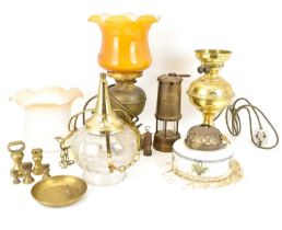 Various lighting to include two brass paraffin lamps converted to electricity, with vintage glass