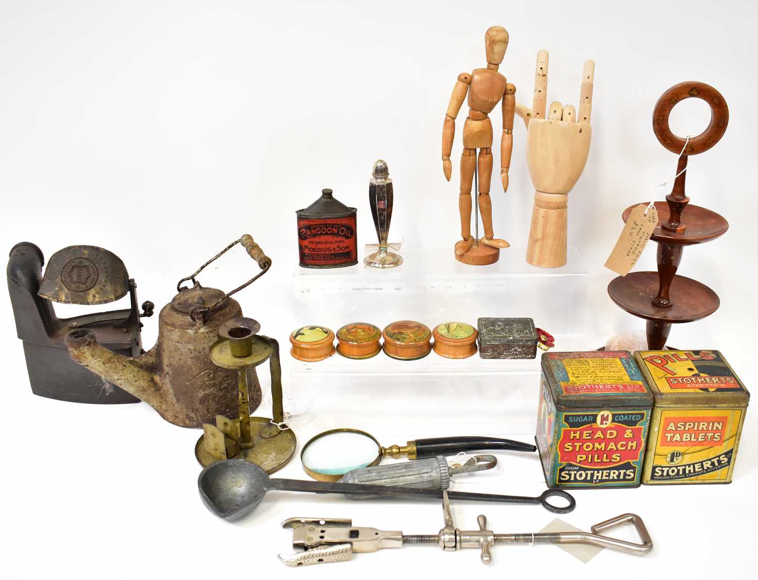 A quantity of various collectors' items, to include two vintage tins, one advertising pills from