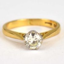 An 18ct yellow gold solitaire ring, the prong set brilliant cut diamond with stated weight of 0.